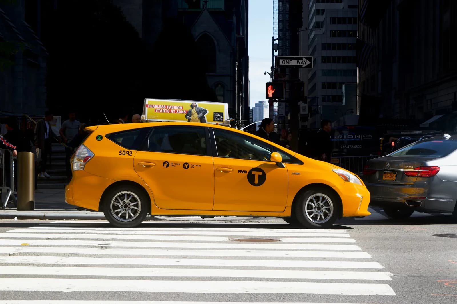 A yellow taxi in the city