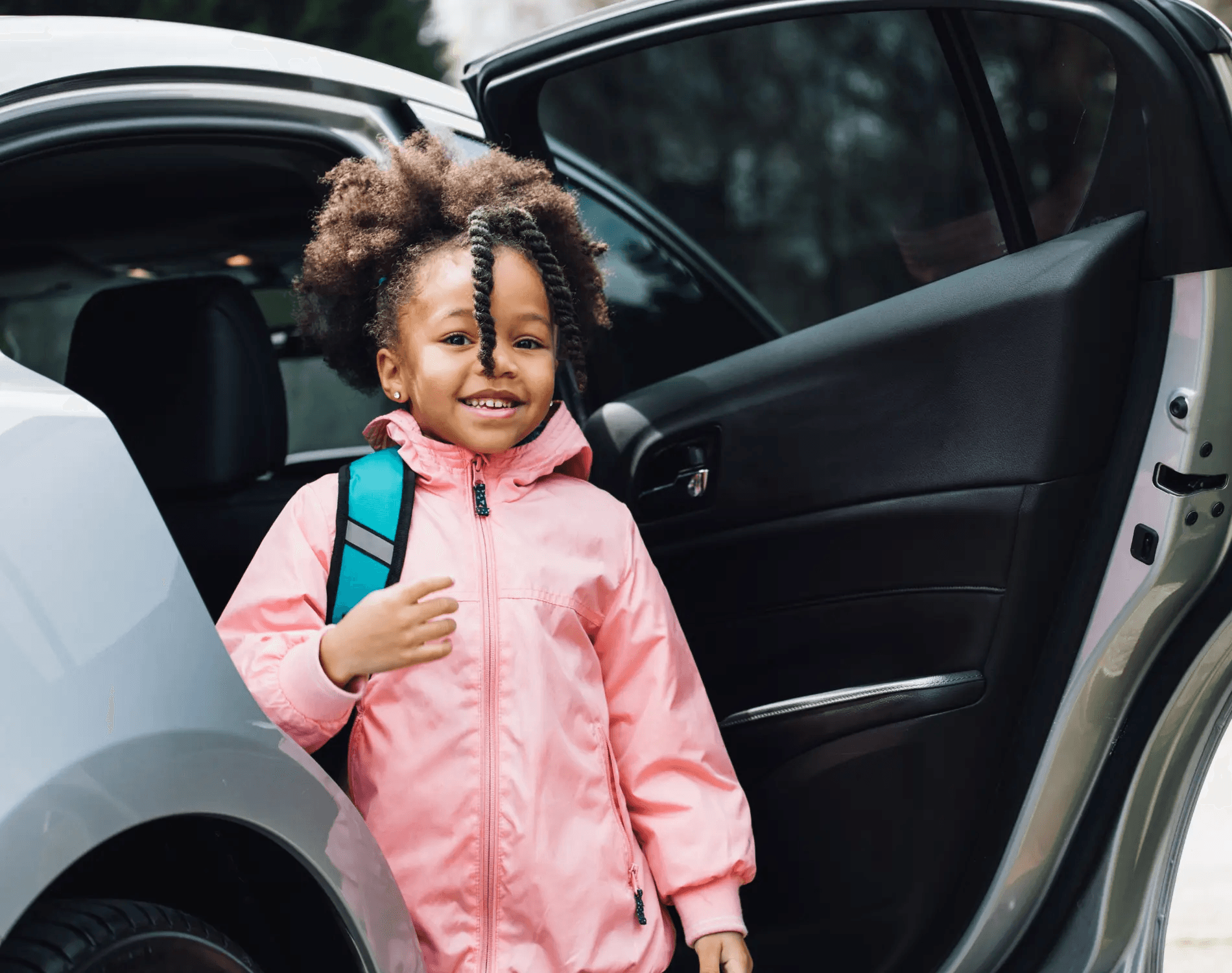 A child arriving for a recurring school transport service